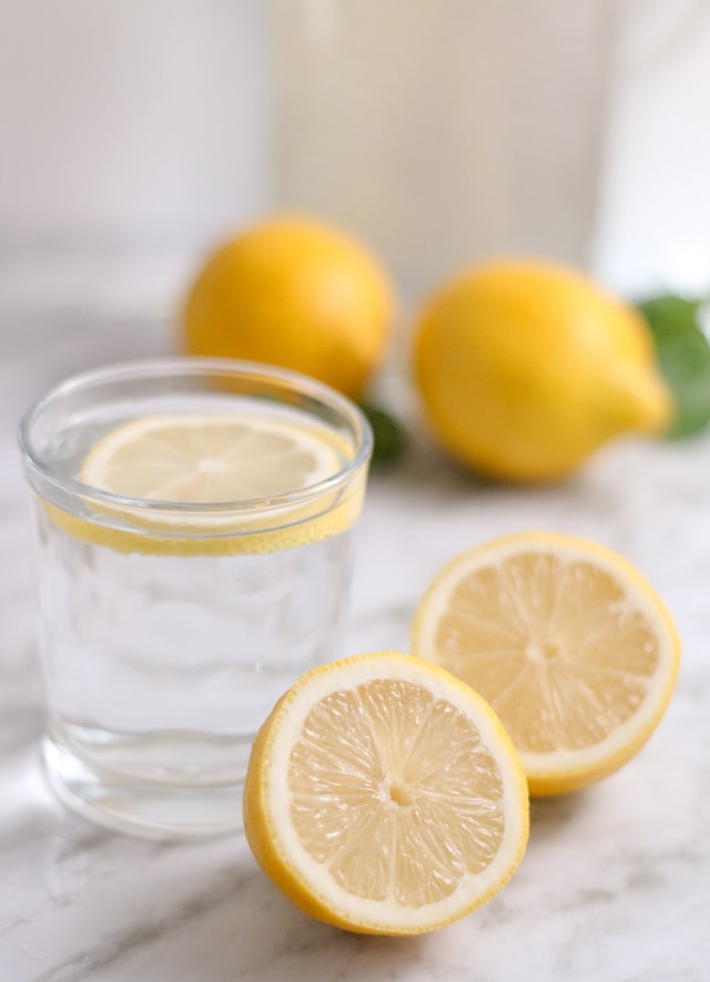 glass of lemon water tess rene schultz