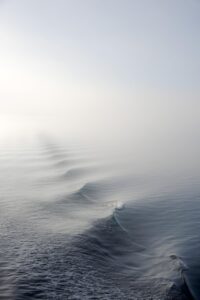 Gentle ocean waves symbolising emotions, in article on accepting what is by Tess René Coaching.