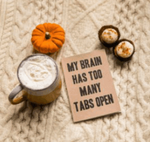Pumpkin and card reading “my brain has too many tabs open,” symbolising how self-trust gets clouded by overthinking and being Indecisive, in article by Tess René Coaching.
