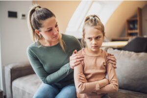 in this Tess René Coaching reparenting article, a mother comforts a frustrated child to represent soothing the inner child.