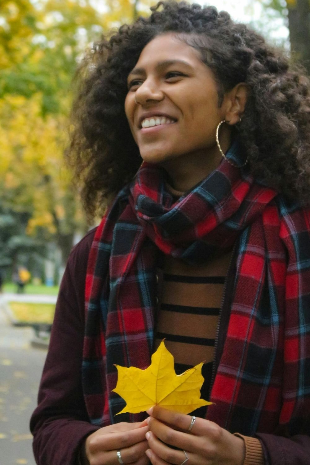 Handling disappointment in this Tess René Coaching article, shown through a woman finding a moment of warmth and hope outdoors.