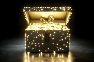 A glowing box filled with light and treasures in an article by Tess René Coaching about using sensory grounding tools to calm the nervous system.