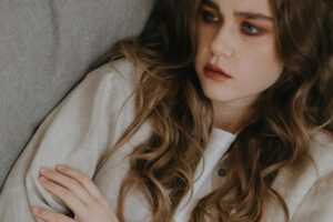 Reflective image in a Tess René Coaching article about listening to the quiet voice beneath fear.