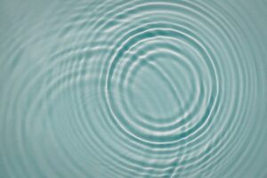 gentle ripples on water symbolising small emotional openings and awareness – Tess René Coaching